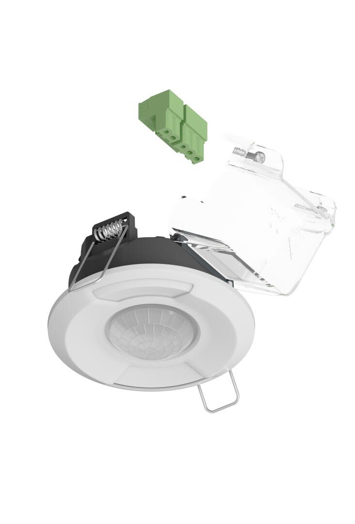 Ein weißer, runder, an der Decke montierter Bewegungssensor mit einem schwarzen Gehäuse, Befestigungsklammern aus Metall, einer durchsichtigen Kunststoffabdeckung und einem grünen Klemmenleistenanschluss, alles auf weißem Hintergrund.