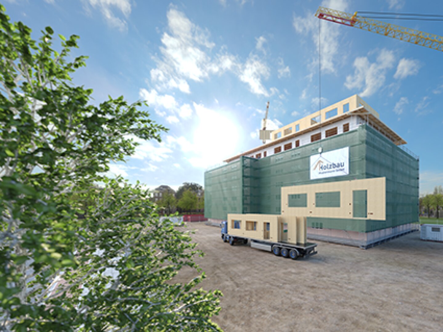 Un chantier avec un grand bâtiment recouvert d'un filet vert, une grue et une remorque transportant des panneaux de bois. Au premier plan, un arbre et un ciel clair avec quelques nuages.